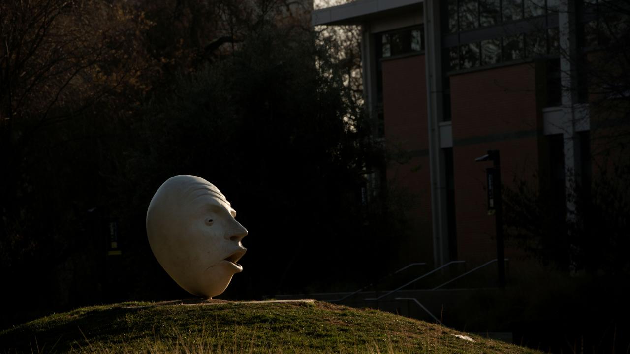 UC Davis Eggghead statue in front of UC Davis Law School.