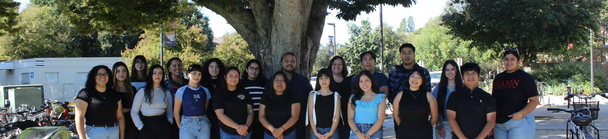 Group photo of the USRC Team standing in front of a tree.